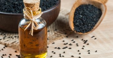 Black,Cumin,Seeds,And,Essential,Oil,With,Bowl,And,Wooden